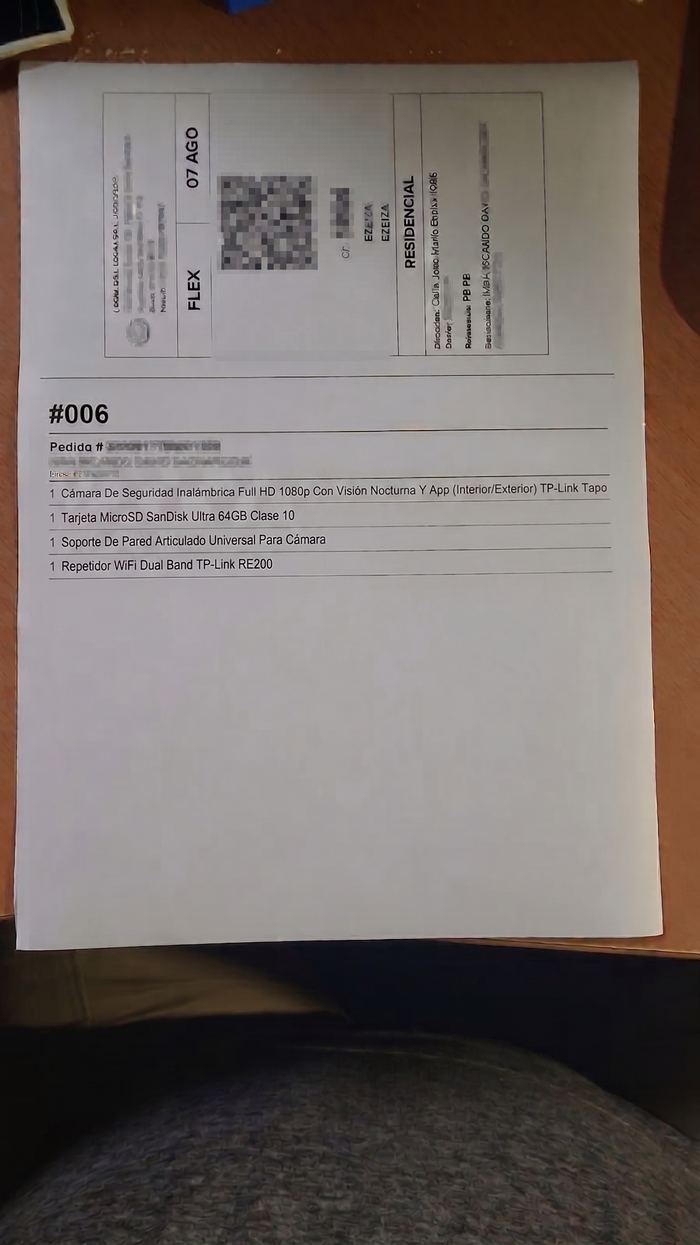 Hoja A4 impresa en una impresora común, con la etiqueta y el detalle del pedido juntos (datos de ejemplo)